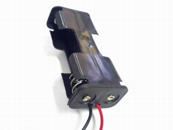 Battery holder for two AA cells sideloader
