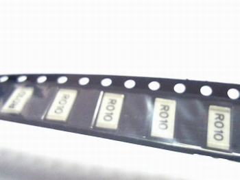 Reel with 1800 SMD resistors 2512 - 0,01 Ohm