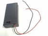 Closed battery holder for two AA cells